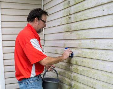 Hand Washing Siding on a House in Brownsville